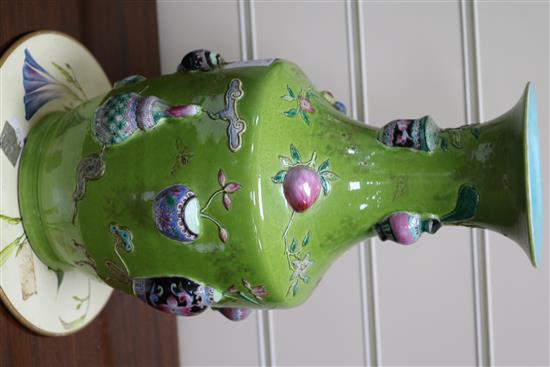 A late 19th century Chinese vase with moulded vase decoration height 35cm